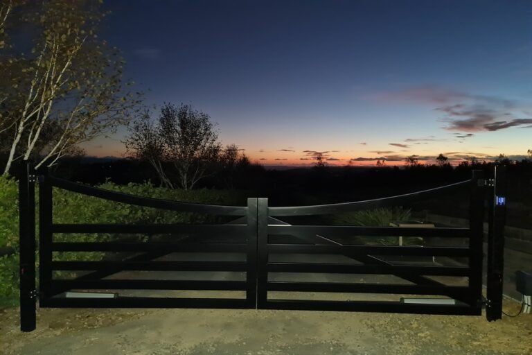 Automatic sliding gate with keypad access control installed by Personal Tech in Auckland